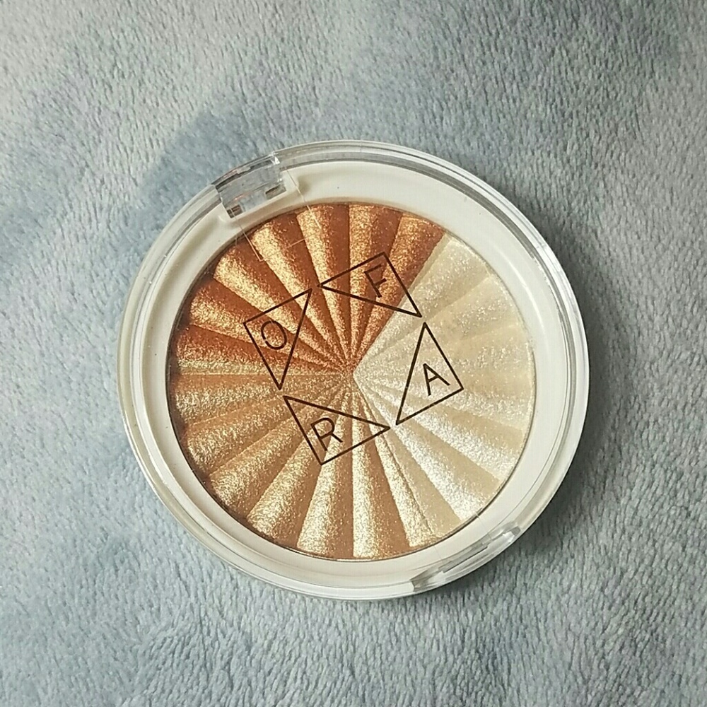 Ofra nikkie tutorials everglow highlighter